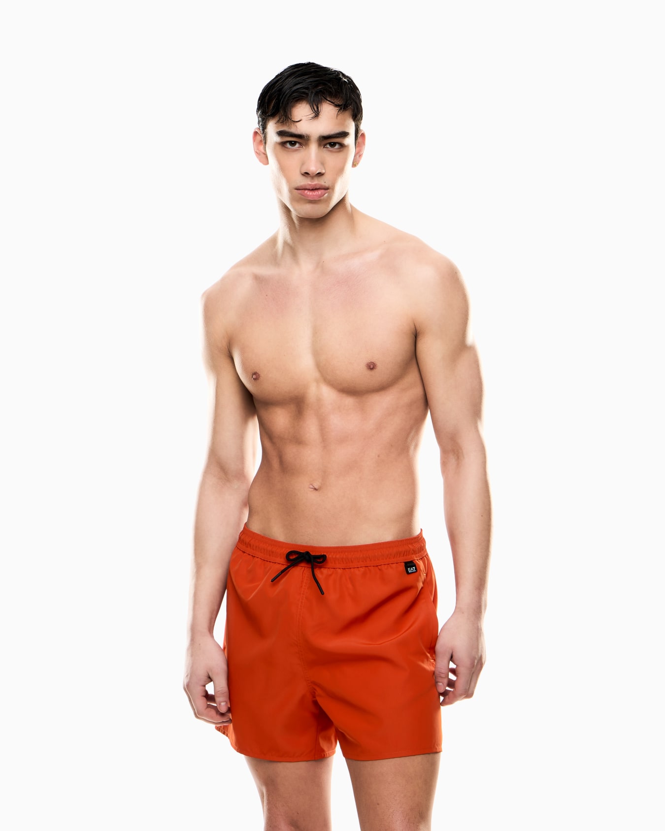 Swim trunks with logo Slide 1